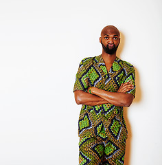 Image showing portrait of young handsome african man wearing bright green nati