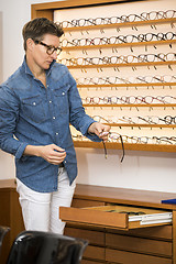 Image showing woman in a eyewear store