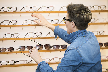 Image showing woman in a eyewear store