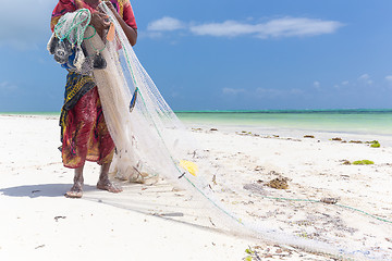Image showing Traditional african local rural fishing on Paje beach, Zanzibar, Tanzania.