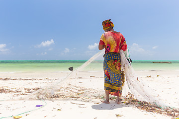 Image showing Traditional african local rural fishing on Paje beach, Zanzibar, Tanzania.