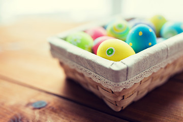 Image showing close up of colored easter eggs in basket