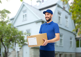 Image showing happy delivery man with parcel box