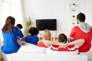 Image showing friends or football fans watching tv at home