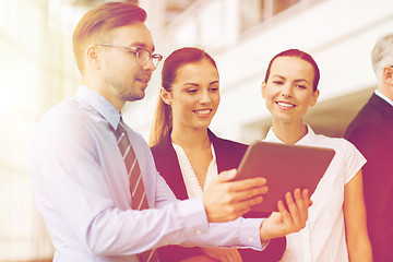 Image showing business people with tablet pc computer at office