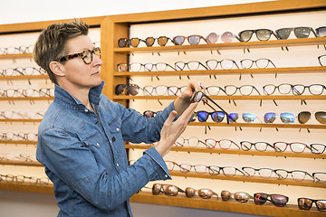 Image showing woman in a eyewear store