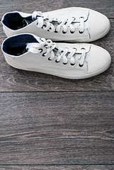 Image showing Pair of new white shoes