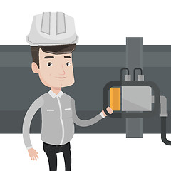 Image showing Operator checking detector on gas pipeline.