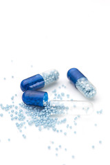 Image showing Blue capsules and pills background
