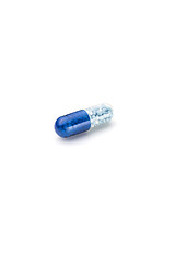 Image showing Blue capsule and pills background