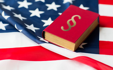 Image showing close up of american flag and lawbook