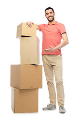 Image showing happy man with cardboard boxes