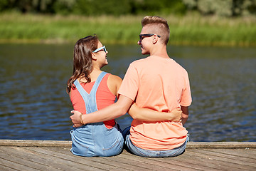 Image showing happy teenage couple hugging on river summer berth