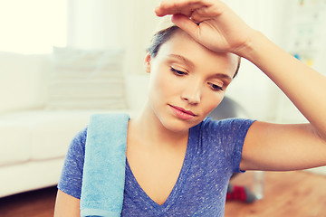 Image showing close up of tired woman after workout at home