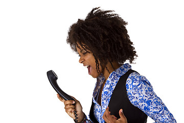 Image showing Angry african american woman with handset
