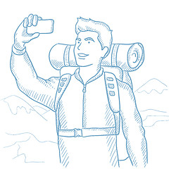 Image showing Man with backpack making selfie.