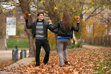 Image showing Happy young Couple in Autumn Park