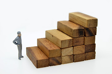 Image showing Way to success with  businessman and wood block step