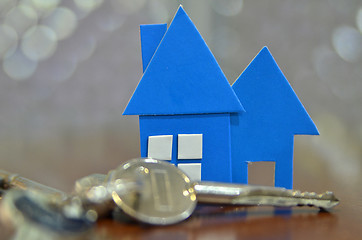 Image showing Bunch of keys with house shaped cardboard