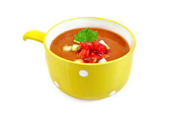 Image showing Soup tomato with parsley in yellow bowl