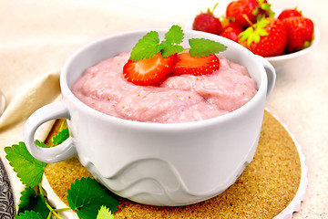 Image showing Soup strawberry in bowl on granite table