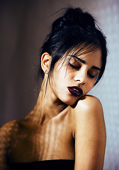 Image showing beauty latin young woman in depression, hopelessness look, fashion makeup modern