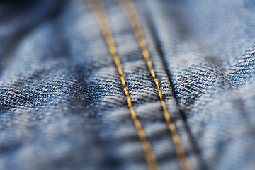 Image showing close up of stitching on denim or jeans clothes