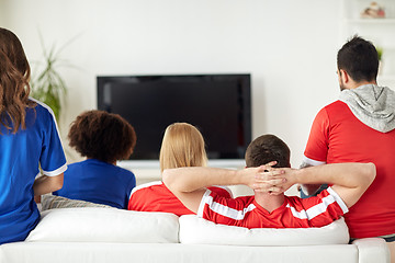 Image showing friends or football fans watching tv at home