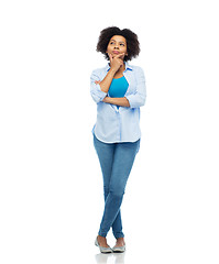 Image showing thinking afro american young woman over white