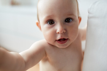 Image showing close up of happy little baby boy or girl at home