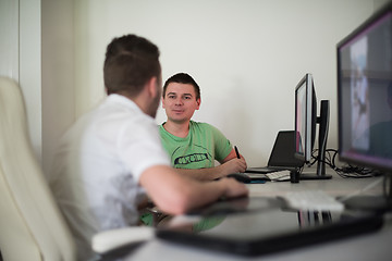 Image showing a group of graphic designers at work