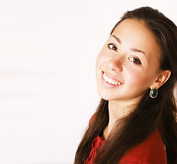 Image showing young pretty brunette woman smiling happy on white background, l