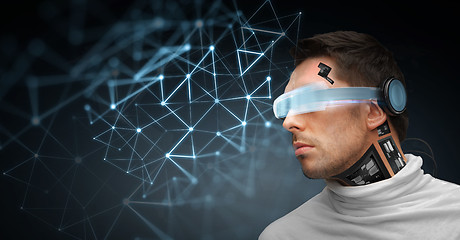 Image showing man with futuristic glasses and sensors