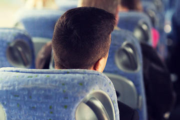 Image showing close up of man sitting in travel bus