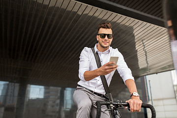 Image showing man with bicycle and smartphone on city street