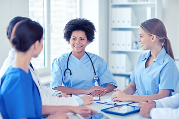 Image showing group of happy doctors meeting at hospital office