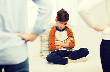 Image showing upset or feeling guilty boy and parents at home