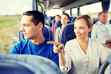 Image showing happy couple or passengers in travel bus