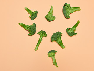 Image showing The fresh broccoli on pink background