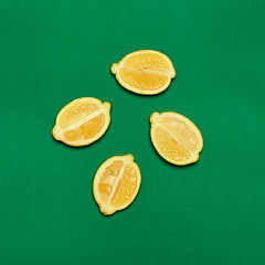 Image showing Lemons on green background