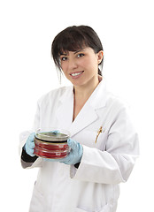 Image showing Scientist carrying petri dishes