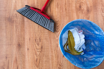 Image showing rubbish bag with trash and cleaning items at home