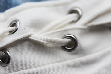 Image showing close up of lacing on clothing item