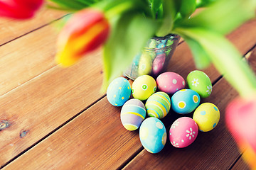 Image showing close up of easter eggs and flowers in bucket