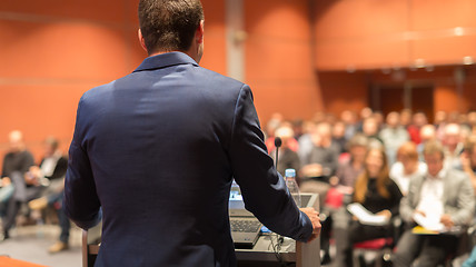 Image showing Public speaker giving talk at Business Event.