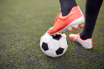 Image showing soccer player playing with ball on football field