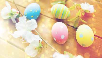 Image showing close up of colored easter eggs and flowers