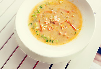 Image showing close up of cream soup plate on table