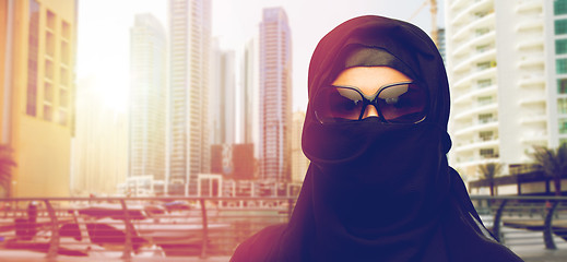 Image showing muslim woman in hijab and sunglasses at dubai city