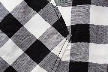 Image showing close up of checkered clothing item with pocket